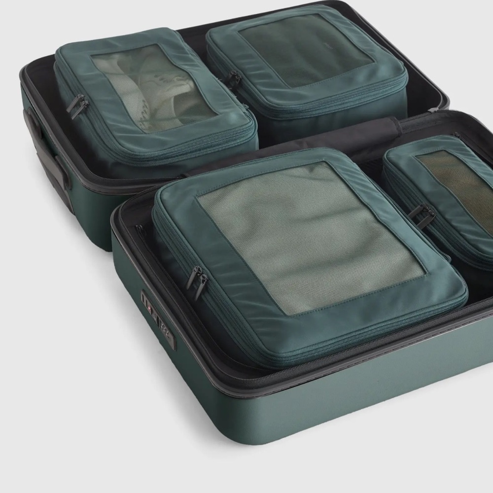 Quince dark green eco compression packing cubes set 6 pieces. New without tags.